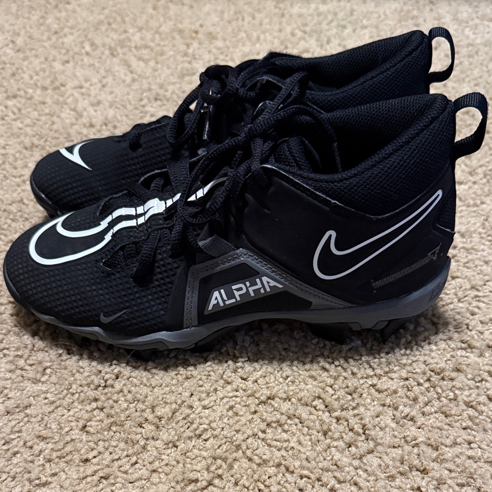 Nike Kids Black and White Alpha Cleats Size 4Y